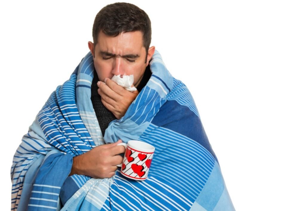 man-sick-with-tea-flu-remedies