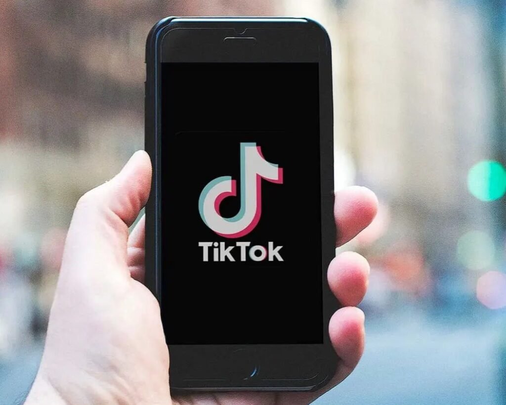 TikTok logo on a smartphone screen